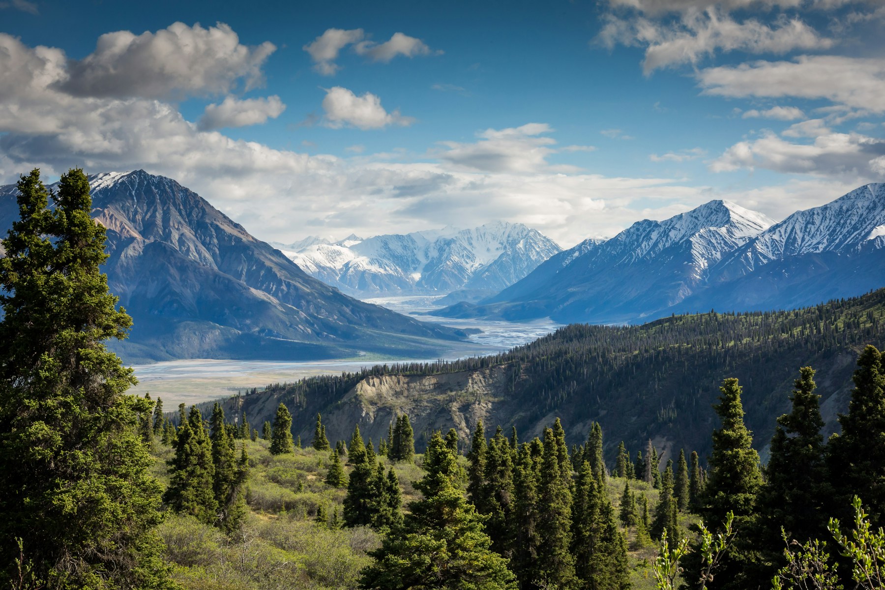 A traveller looking across a New Zealand mountain landscape